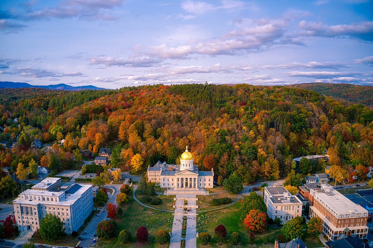 An aerial view of Vermont’s gold-domed State House surrounded by autumn foliage in Montpelier.