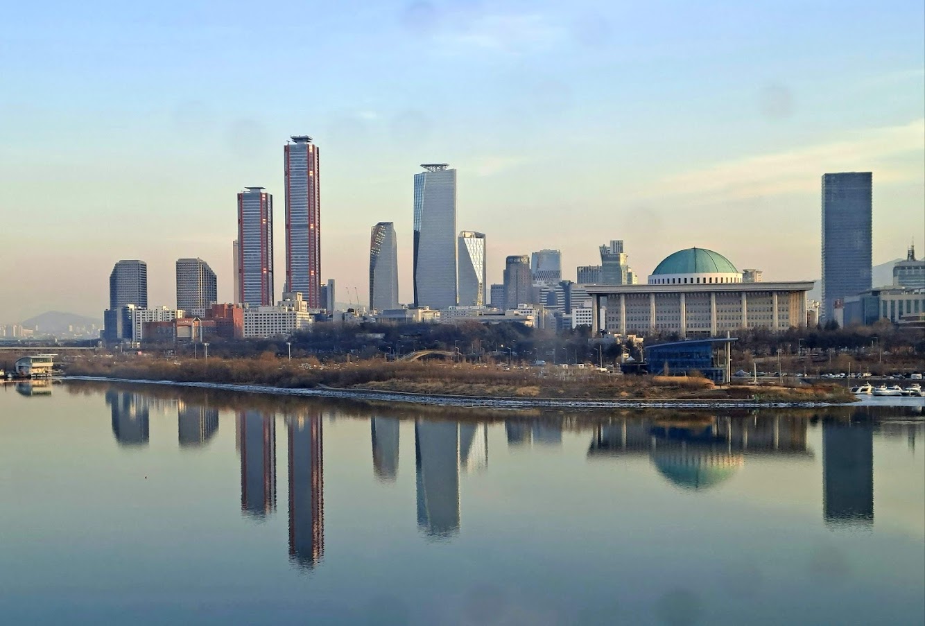 The Yeouido skyline in Seoul, reflected in the Han River.